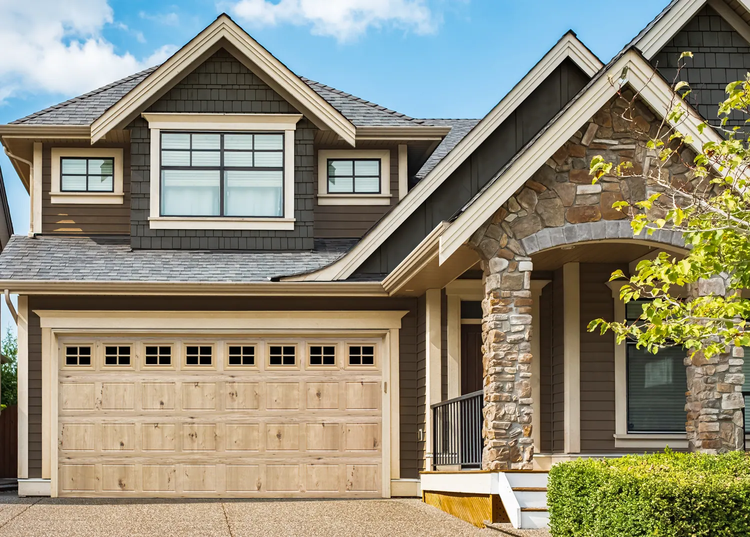 Safe-Way Bi-Directional Wood Grain garage door in Natural