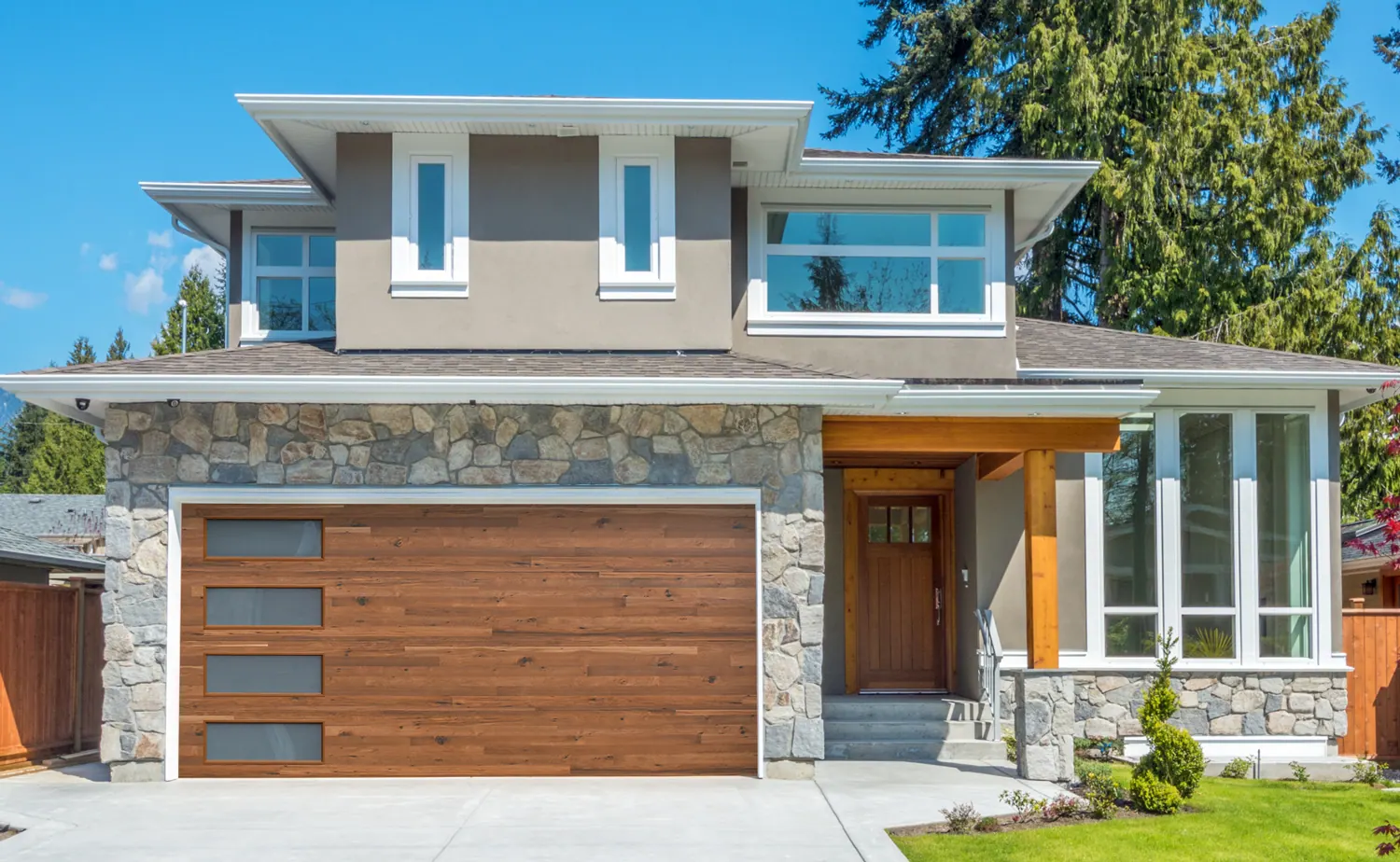 Safe-Way Plank Wood Grain door installed on a contemporary home