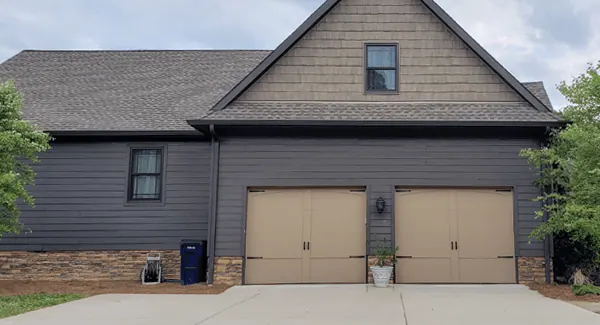 Safe-Way Aristocrat Monarch garage doors in a tan finish
