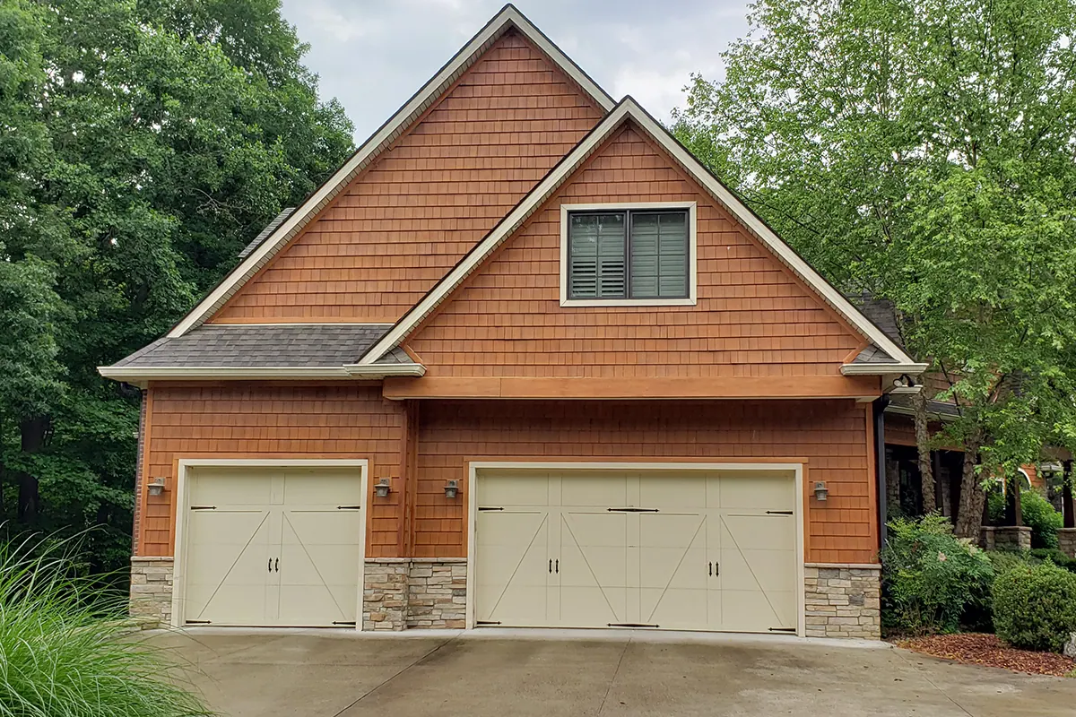 Safe-Way Aristocrat Presidential garage doors on a shingled craftsman home