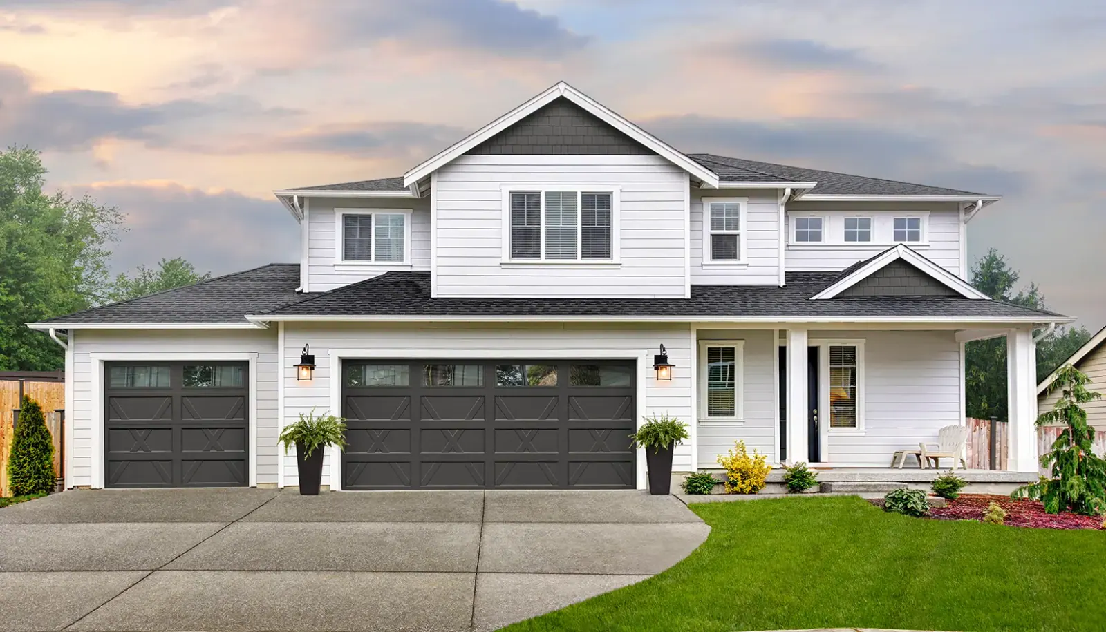 Carriage house farmhouse style garage door with X overlay and windows