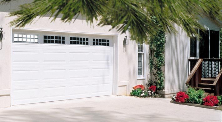 Traditional Long Panel design in True White with Stockton window inserts.