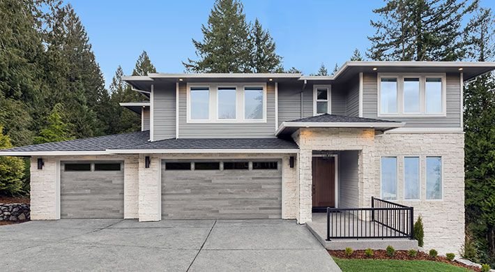 Aspen Gray plank with color matched Long Panel windows with clear glass.