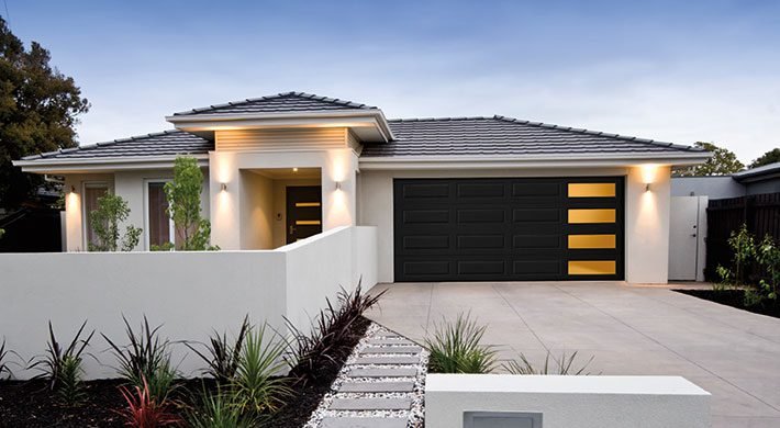Traditional Long Panel design in Black with Clear Mosaic windows along right side of the garage door