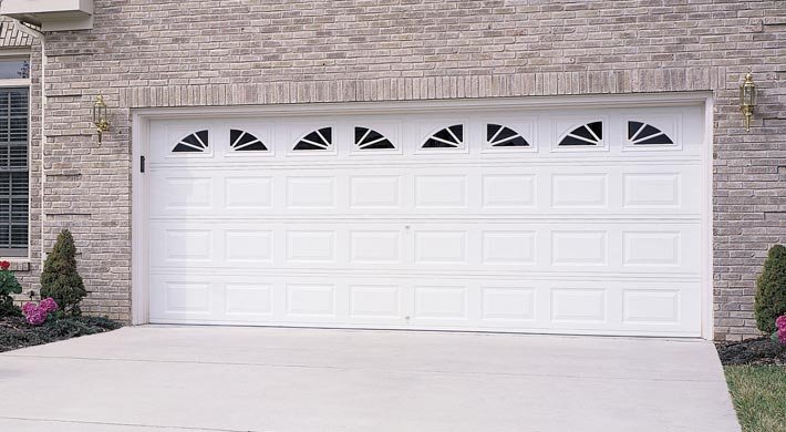 Traditional Short Panel design in True White with Wagon Wheel window inserts